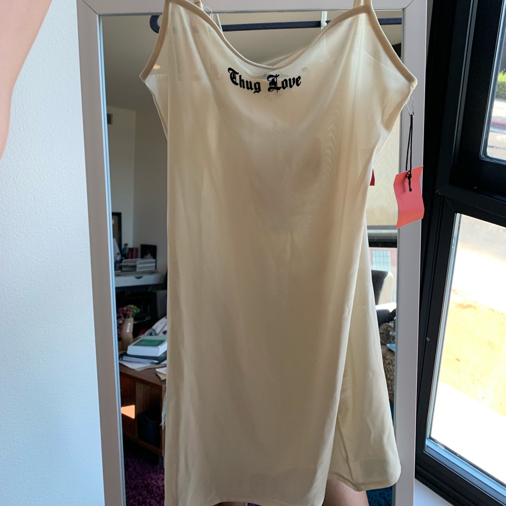 Sheer thug love mini dress!